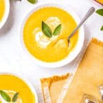 A close up picture of the finished Butternut Squash And Apple Soup recipe.