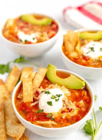 Tortilla soup in bowls ready to eat.