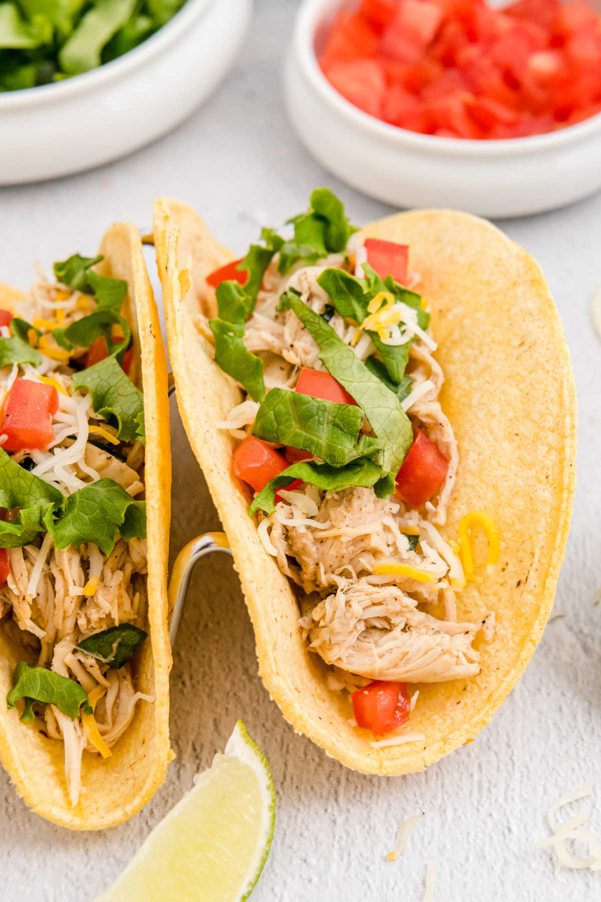 These Crockpot Shredded Chicken Tacos are my go-to weeknight dinner. They’re juicy, flavorful, and SO easy to make. via @foodfolksandfun