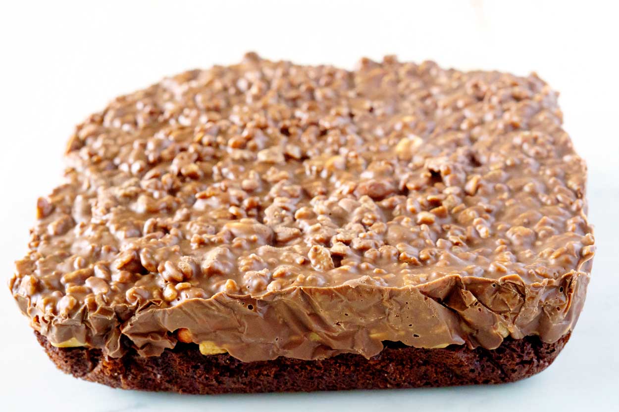 Chill the Peanut Butter Cup Crunch Brownies until set.