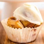 Cinnamon Roll Cupcake with icing on top.