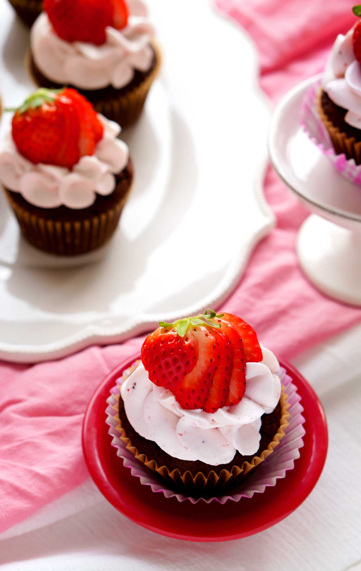 The best Dark Chocolate Cupcakes with Strawberry Swiss Meringue Buttercream
