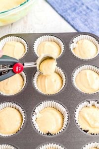 Fill the cupcake tins with paper liners and fill them with batter.