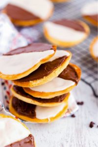 Black and white cookies stacked on top of each other.