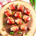 Dates stuffed with goat cheese and almonds and wrapped in bacon.