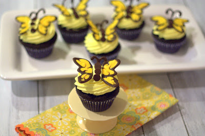 Butterfly cupcakes on a serving platter