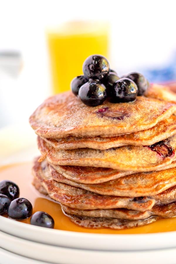 A closeup picture of a stack of buckwheat pancakes.