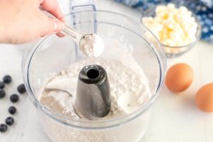 Add the dry ingredients to a food processor and pulse.