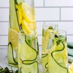 lemon and cucumber water in glasses.
