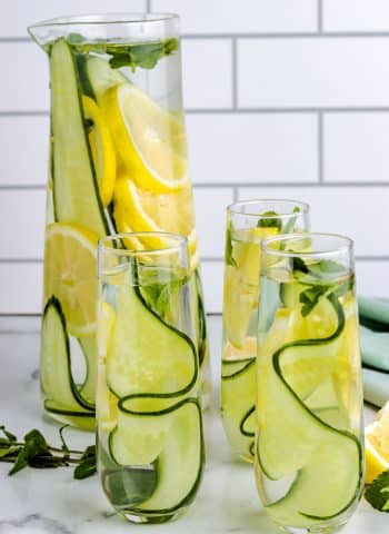 lemon and cucumber water in glasses.