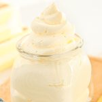 The finished Whipped Butter recipe swirled into a glass jar.