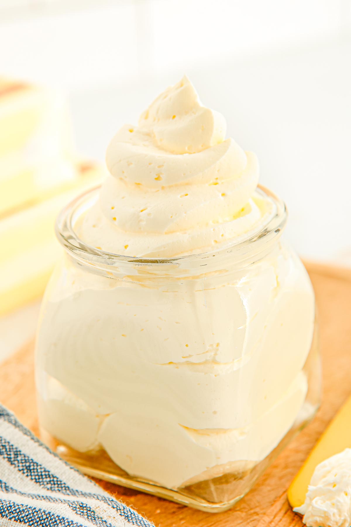 A close up picture of the finished Whipped Butter in a glass jar.