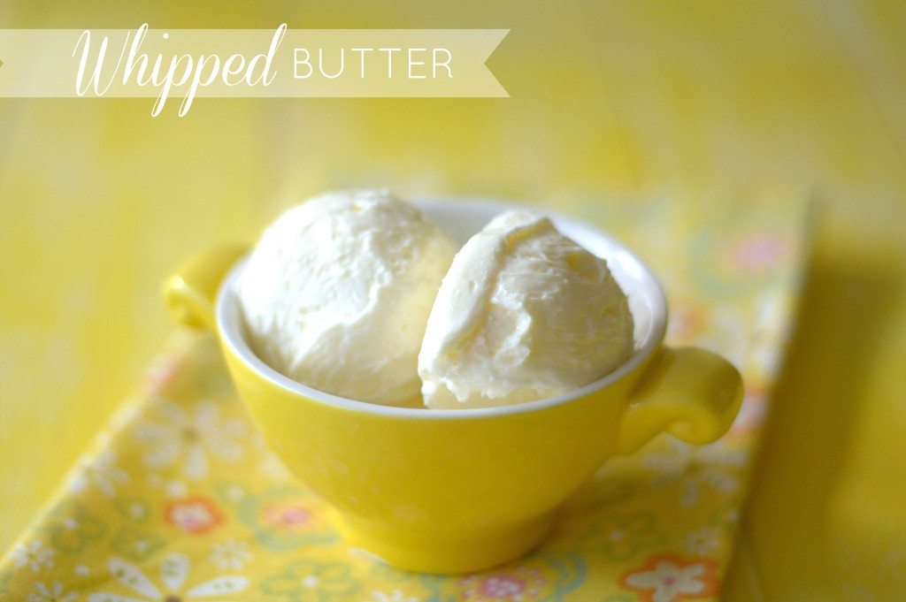 two scoops of whipped butter in a small bowl with text overlay for Pinterest