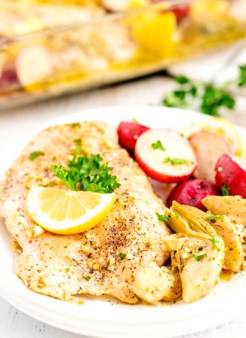 Baked Lemon Chicken on a plate with potatoes
