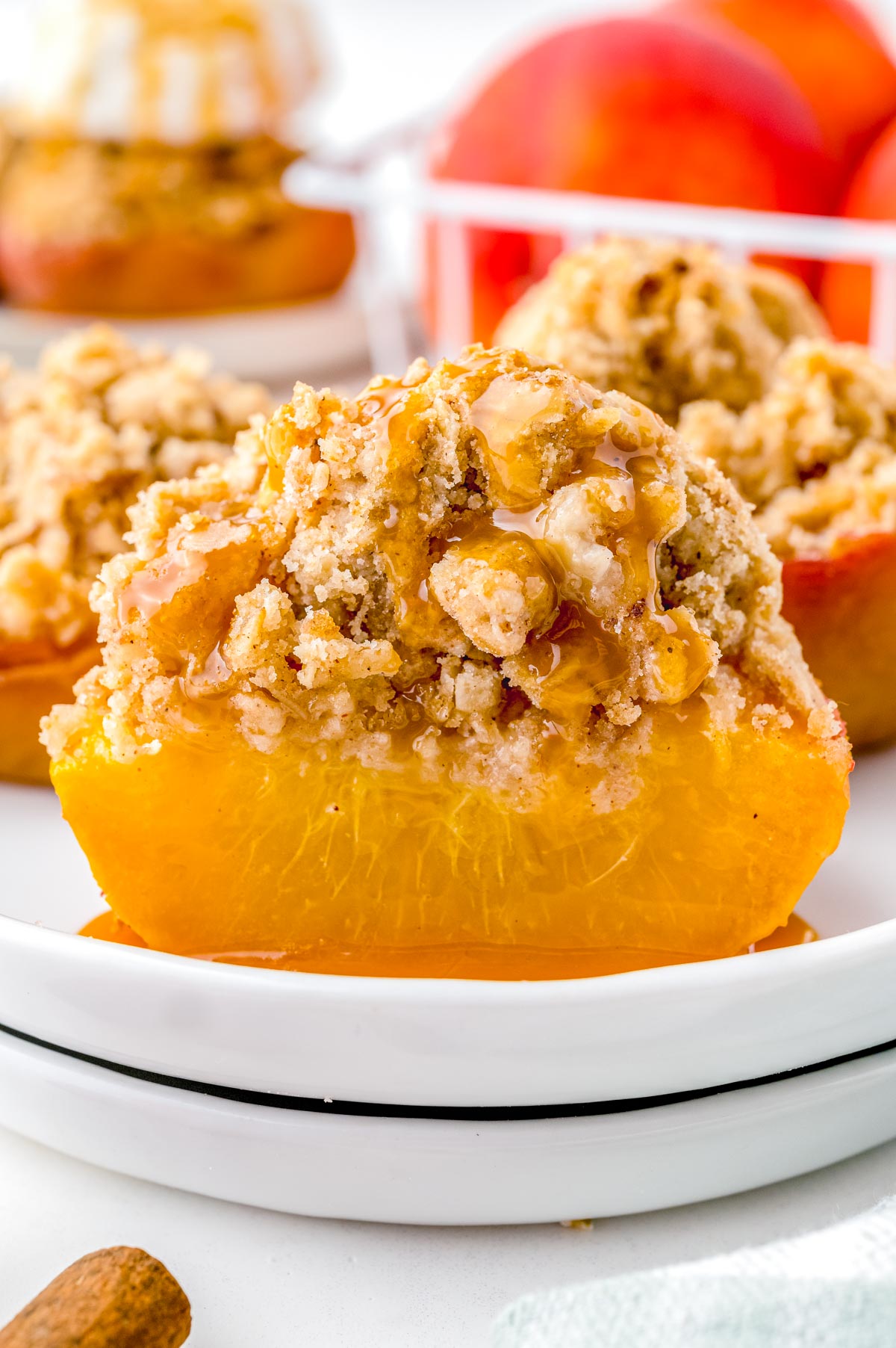 The finished recipe for Baked Peaches cur into so you can what it looks like on the inside.