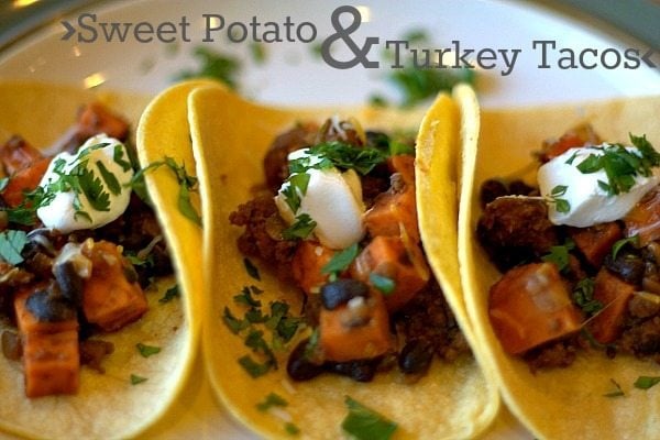 sweet potato and turkey tacos on a plate with text overlay for Pinterest