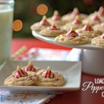 Peppermint Cookies on a plate and on a cake pedestal with a glass of milk.