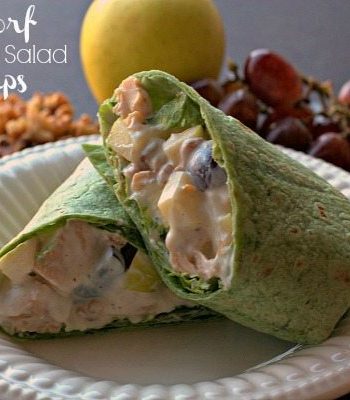 A finished Waldorf chicken salad wrap with text overlay for Pinterest.