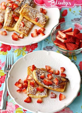Strawberries and Philly Cream Cheese Blintzes on a plate