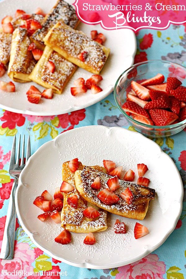 Strawberries and Philly Cream Cheese Blintzes on a plate