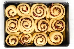 Add the sticky buns to the pan and rise until doubled in size.