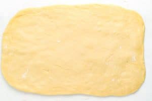 Roll the dough into a large rectangle.