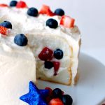 A Patriotic Tunnel Cake on a cake stand