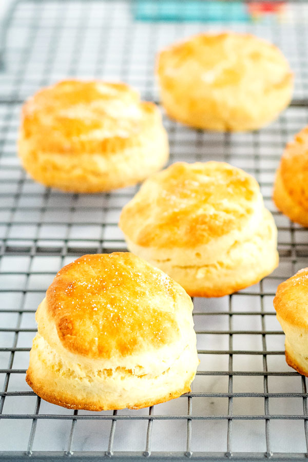 Golden biscuits on a wire cooling rack.