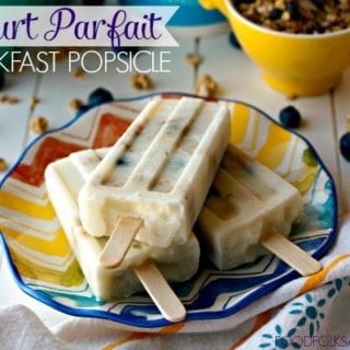 Yogurt Parfait Breakfast Popsicles on a plate with text overlay for Pinterest