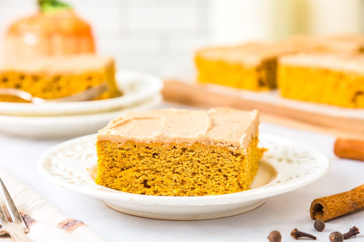 A piece of Browned Butter Pumpkin Cake on a white plate.