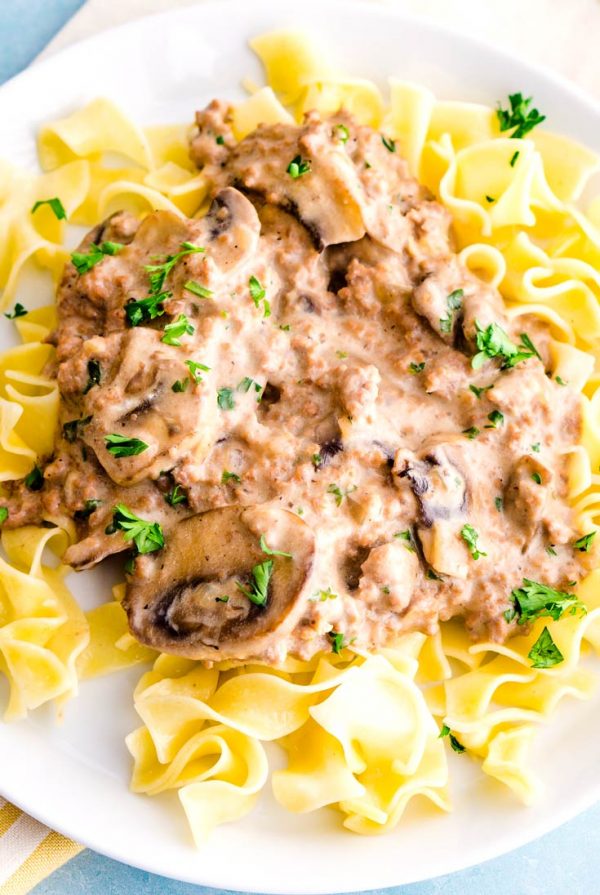 Overhead picture of Ground Beef Stroganoff over egg noodles.