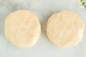Divide the dough in two and pat into disks and chill.