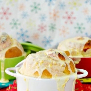 Cranberry Rolls with orange icing in small bowls