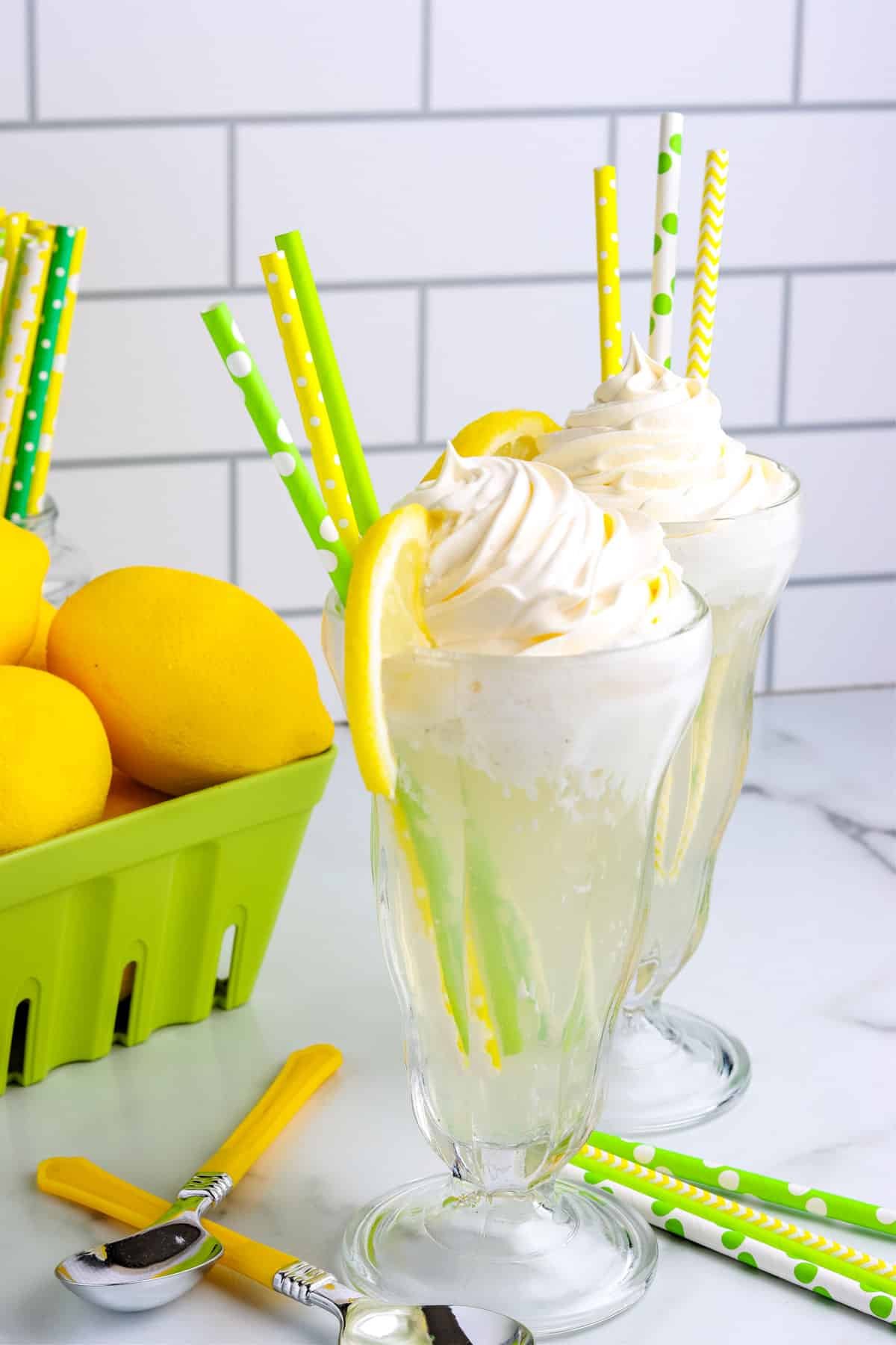 The finished Lemonade Float in a clear class with a straw. 