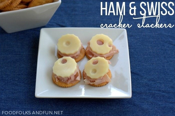 Ham and Swiss Cracker Stackers on a white plate. 