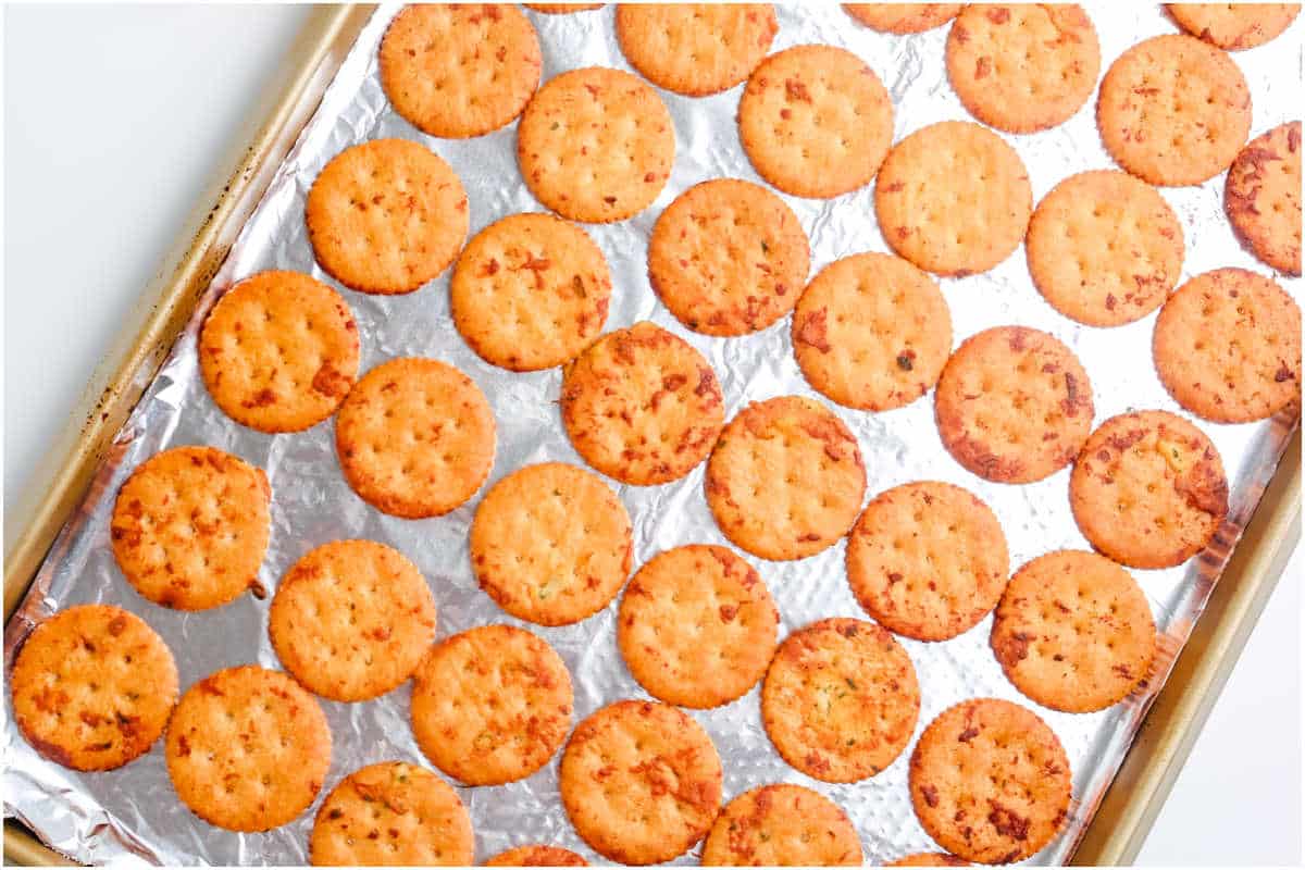 The finished ranch crackers on a foil-lined pan.