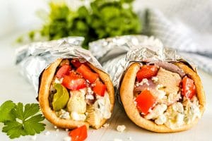 Wrap the pitas up and serve.