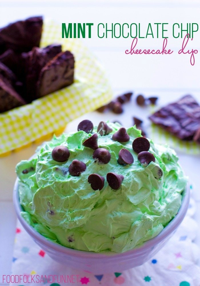 Mint Chocolate Chip Cheesecake Dip in a white serving bowl with chocolate chips sprinkled on top.