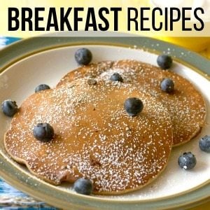 Pancakes with blueberries with text overlay for social media