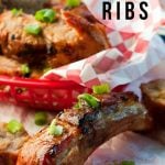 Honey Garlic Sticky Ribs in a basket with text overlay for Social media
