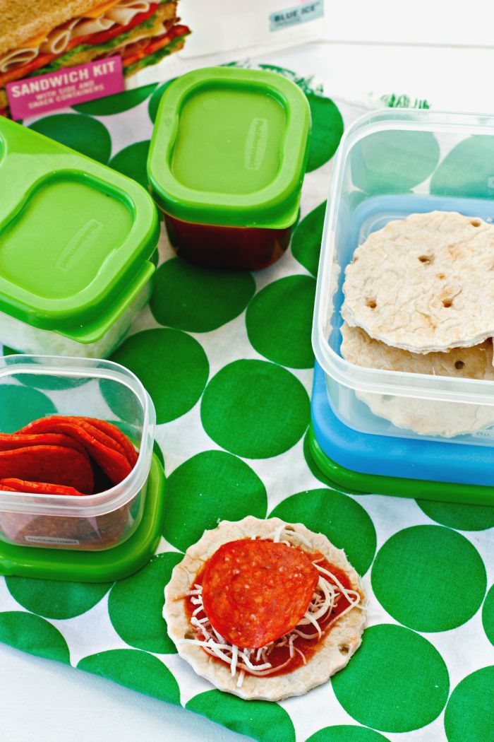 Lunch Box Pizzas in plastic containers for packing
