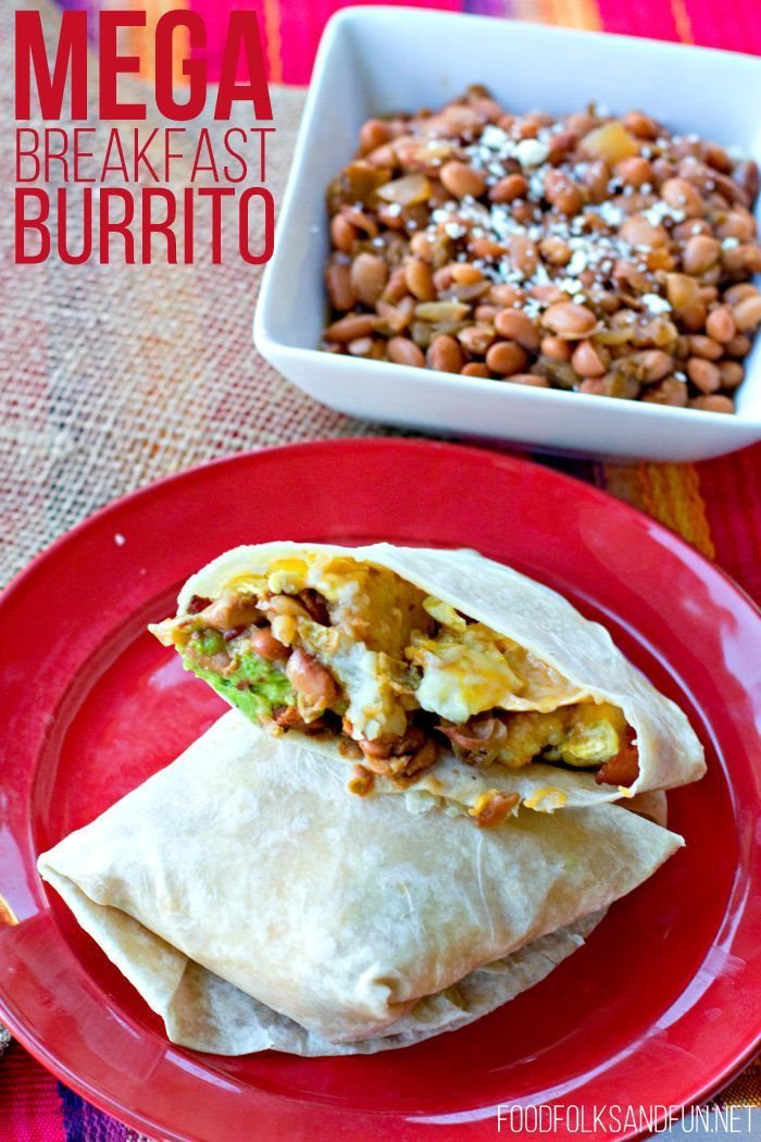 Breakfast Burrito on a plate with pinto beans on the side with text overlay for Pinterest