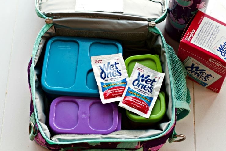Packing Lunch Box Tacos in a lunchbox with wet wipes