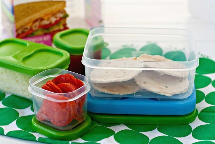 Ingredients needed for making lunch box pizzas in Tupperware containers