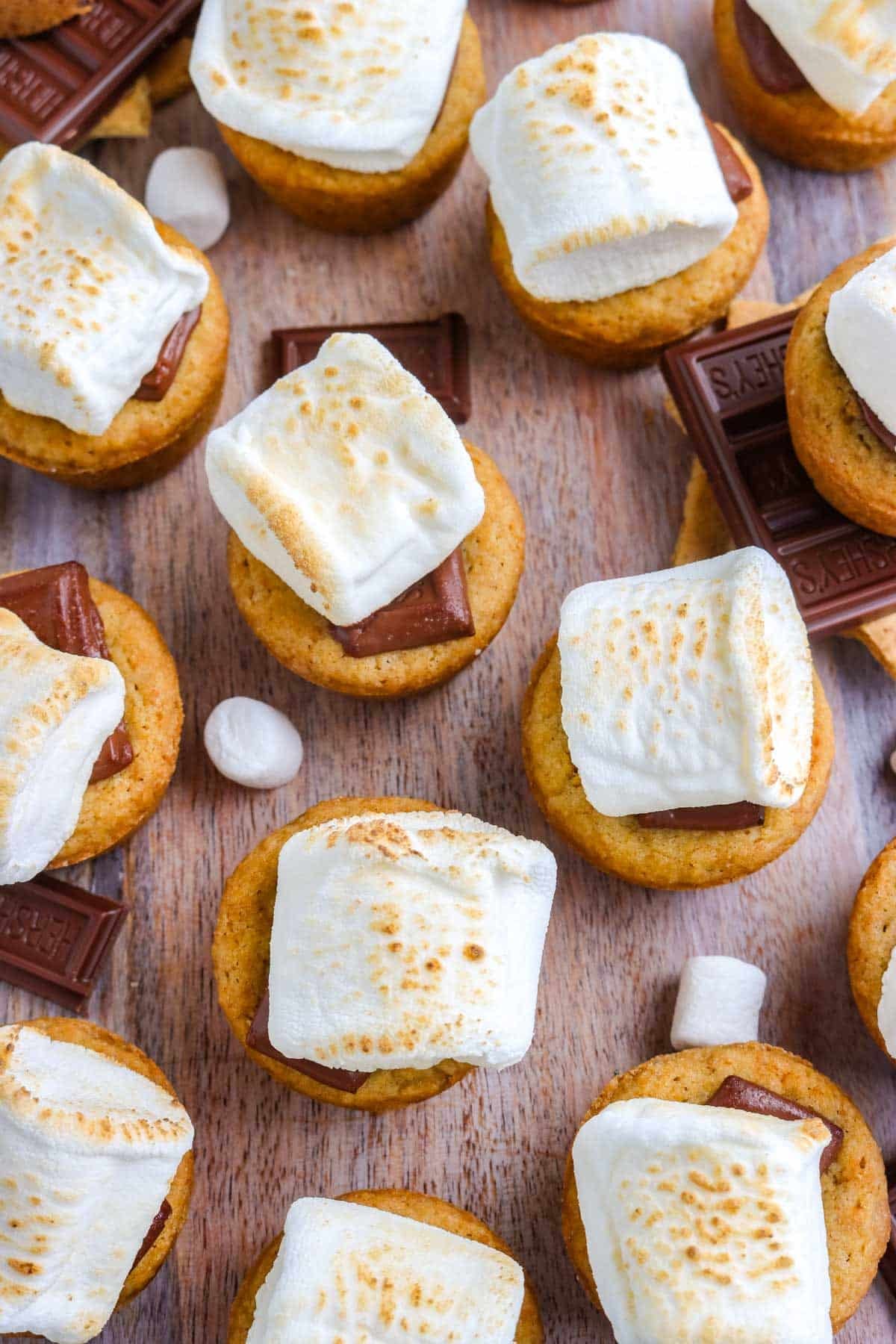 An overhead picture of the finished smores bites recipe on a wooden serving platter.