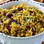 This Cranberry-Pecan Curry Rice is full of Fall flavors and soul-warming curry! Serve it for a weeknight dinner or on Thanksgiving!