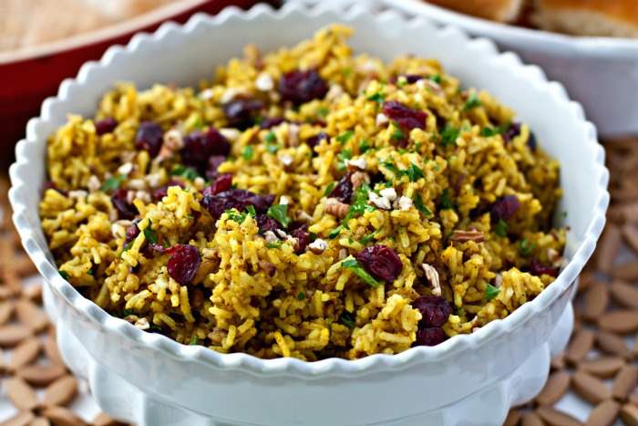 This Cranberry-Pecan Curry Rice is full of Fall flavors and soul-warming curry! Serve it for a weeknight dinner or on Thanksgiving!