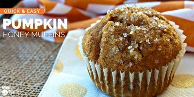 Pumpkin muffin with sparkling sugar on top.