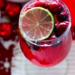 Make this Cranberry Limeade Sparkling Cocktail for your next holiday party. It's to perfect festive mocktail for Christmas and New Year's!