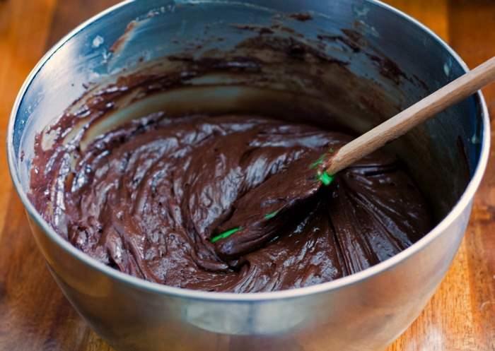 Hot fudge batter in a stainless steel bowl. 